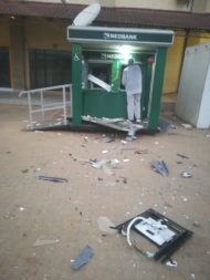 FIVE ATM BOMBING SUSPECTS AT LARGE