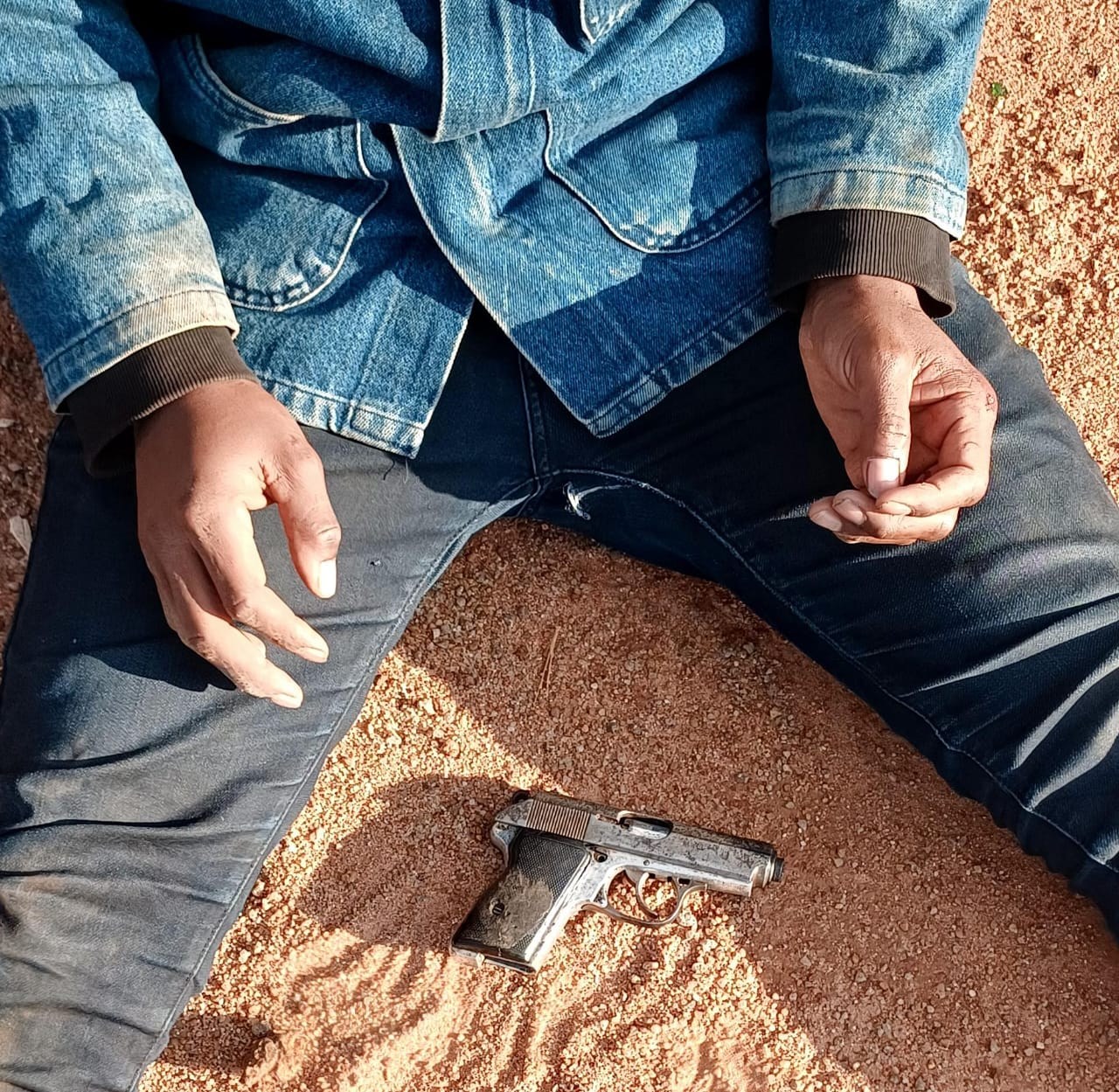 A 27-YEAR-OLD SUSPECT ARRESTED FOR POSSESSION OF REPORTED STOLEN UNLICENSED FIREARM